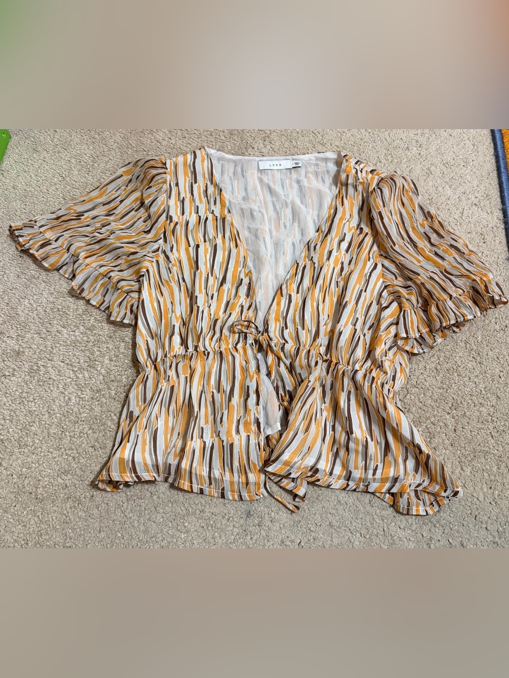 NWOT. Lush Marigold Brown Paint Stroke Ruffle Sleeve Tie Front Blouse.